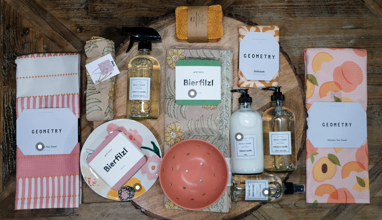 A photo of various Berry + Basil products on a wooden table.
